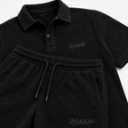 1HUNNA Casual Terry Set in zwart – detail van polo en shorts