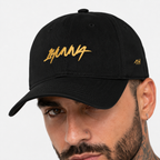 1HUNNA Signature Keep It Real Cap in zwart en goud – voorkant