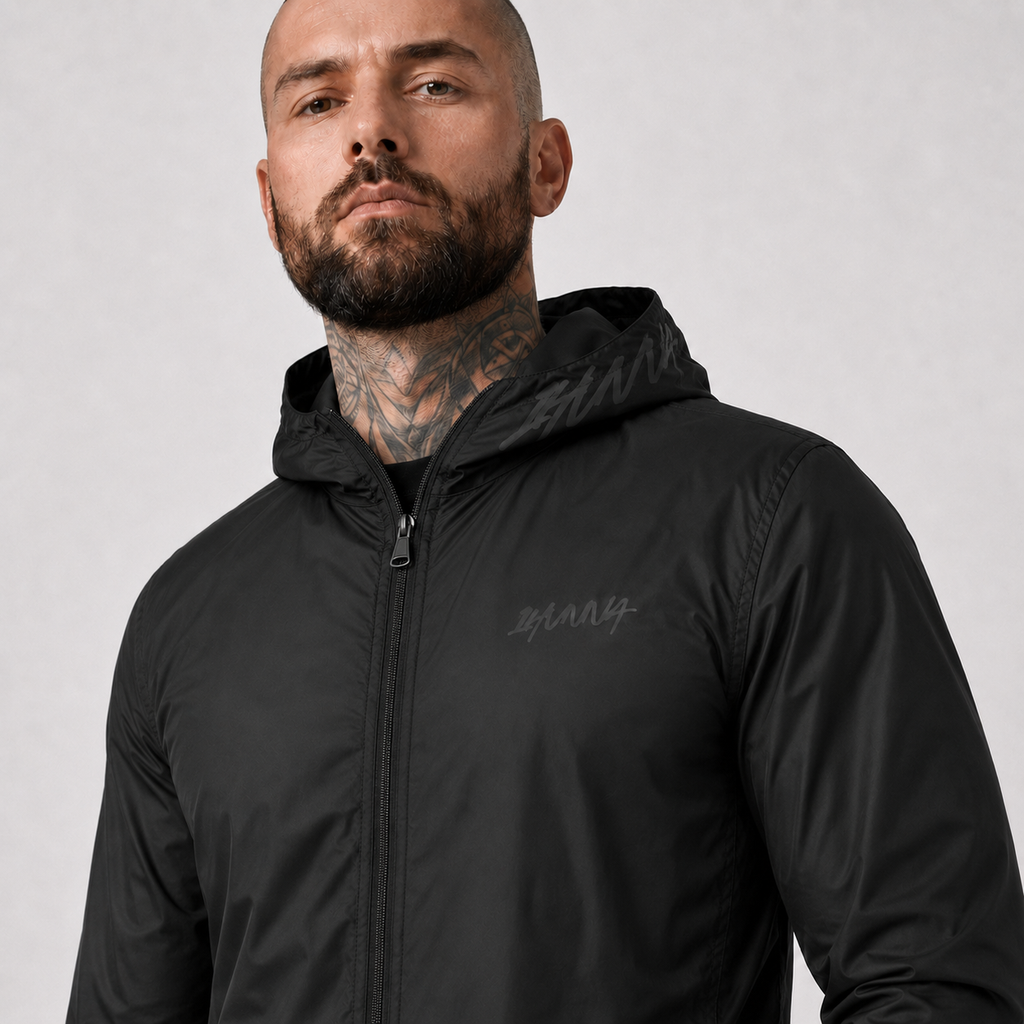Black 1HUNNA Ghost Windbreaker – chest logo and hood detail